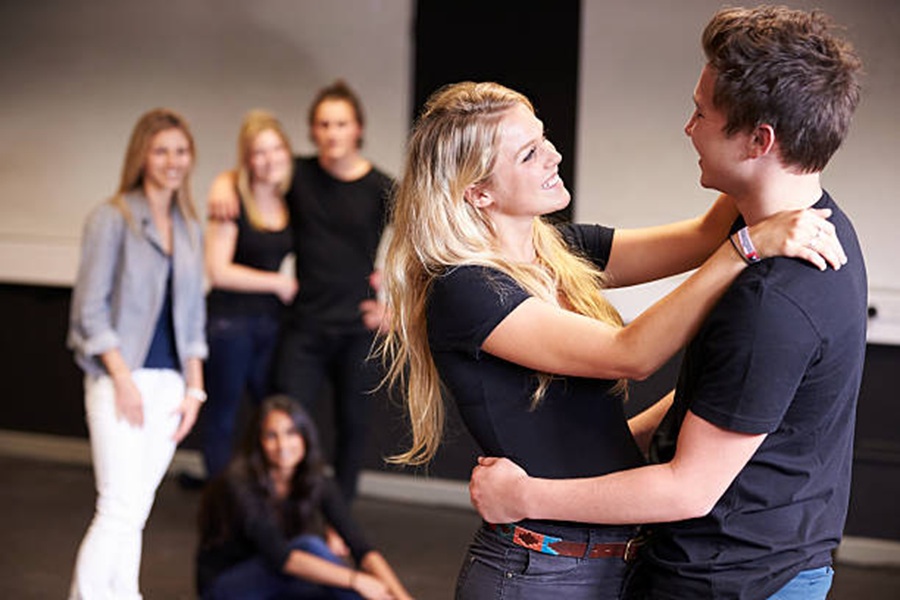 Students Taking Acting Class At Drama College Dancing